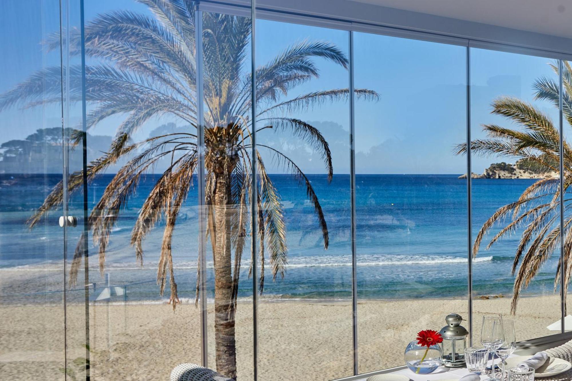Secrets Mallorca Villamil Resort & Spa - Adults Only Peguera Exterior photo View of the beach from the hotel